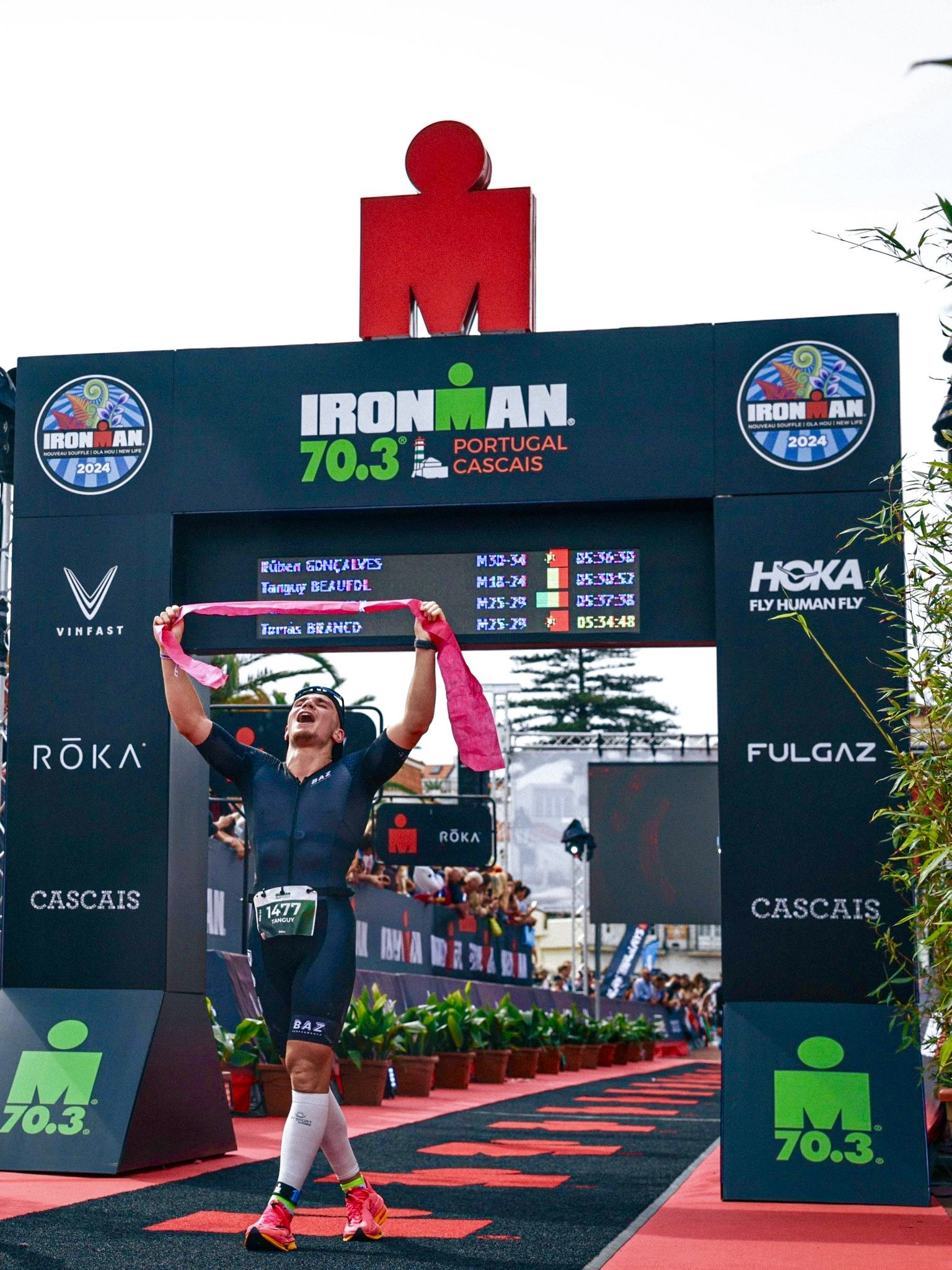 Ironman finisher celebrating at finish line